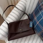 Creator collaboration with Coach by @thebettyjournal